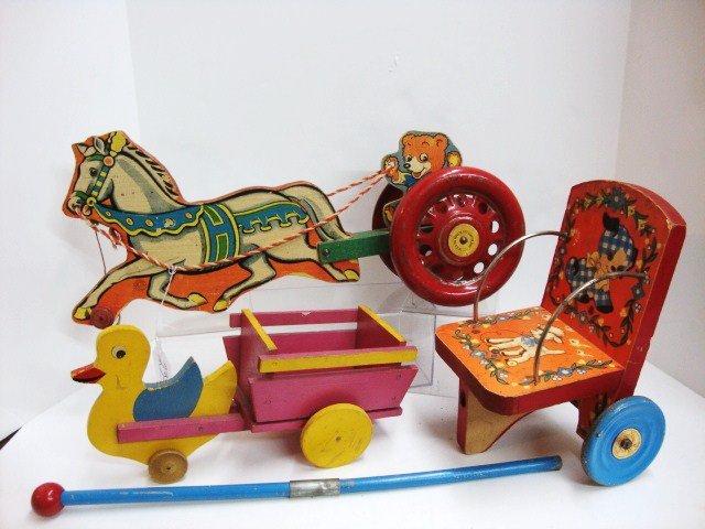 Wooden Pull Toys: N.N. Hill Bear on horse cart toy 20" (l), Easter duck pulling cart 12 1/2" (l), Gong Bell Co. doll chair