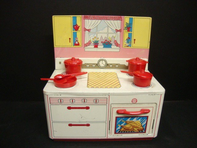 Childs Ohio Art Lithographed Stove: Childs lithographed stove by Ohio Art with original red plastic pots and pans. 8 1/2 x 7 3/4 x 4 1/2 "