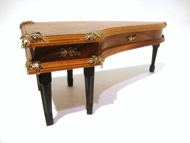 George Becker Harpsichord: Elaborately detailed walnut harpsichord with burled veneer and brass trim. 3" H, 8" L.