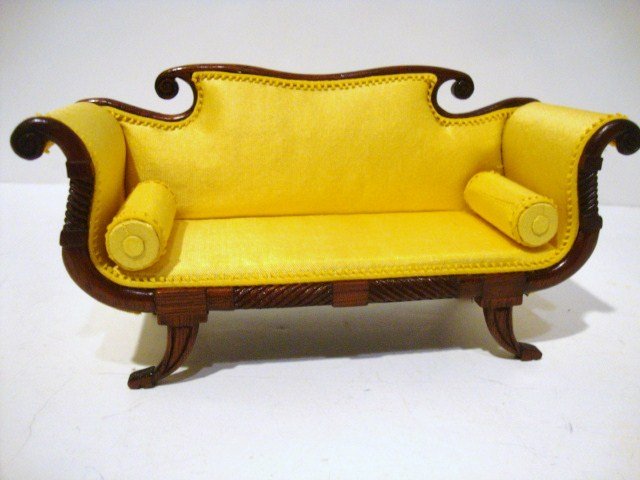 David Booth Gold Settee: Charming Regency settee upholstered in gold cotton sateen. 3" H, 6" L.