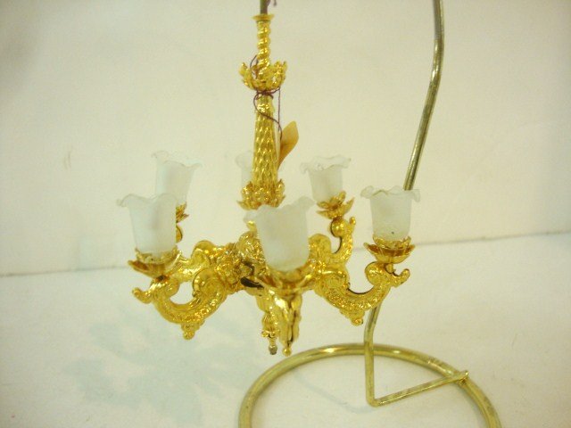 Ellen Krucker Blauer Chandelier: An ornate and imposing gold-plated six-arm chandelier with Tulip Shades by Ellen Krucker Blauer. 3.5" H.