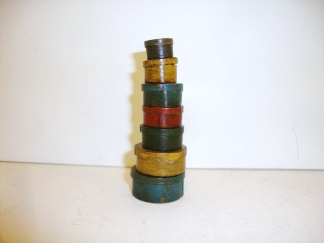 Barbara Davis Pantry Boxes: An impressive stack of painted pantry boxes by Barbara Davis. Seven in all, the largest 1/2" H and 1.25" diameter. Stuck together with wax.