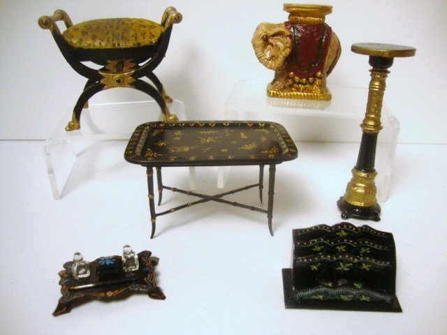 Charlotte Hunt Accessories: A classical cushioned seat with faux leopard upholstery by Charlotte Hunt 2" H, 2.5" W, a decorated metal tray table and an assortment of elegant accessories including an elephant stand signed Roslyn,