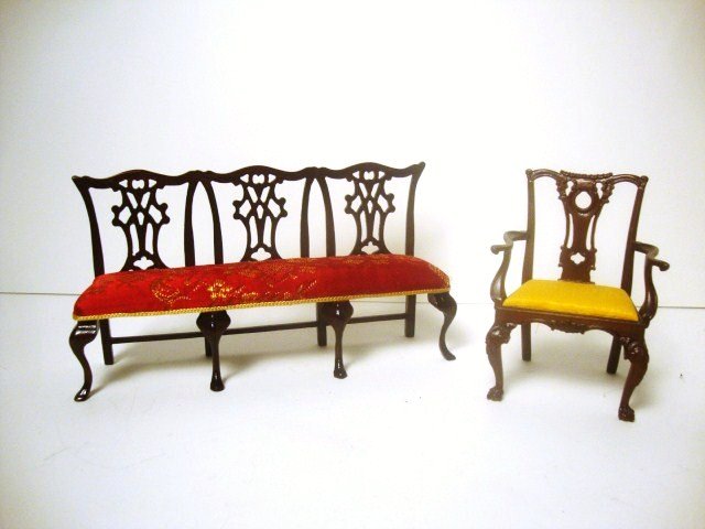 Charles Krug Armchair: Finely handcarved Chippendale armchair with silk brocade upholstered seat 3.25" H and a three-seater Chippendale settee by Chuck Sudler 6" L.