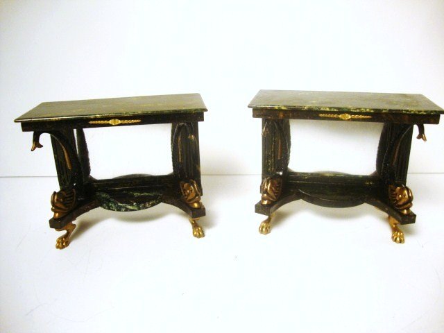 Susanne Russo Empire Tables: A pair of mirrored console tables with Dolphin mounts and faux marble painted surfaces. Finish has some clouding. 3" H, 4" L.