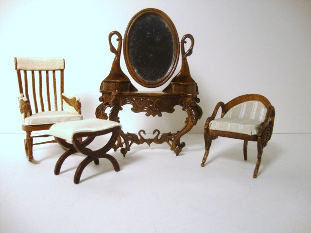 Susanne Russo Swan Vanity: Companions to the previous lot, a fancifully carved vanity with oval mirror 5.5" H, 4.5" W with stool and a matching swan chair. Also a Bespaq rocking chair with carved swan arms.