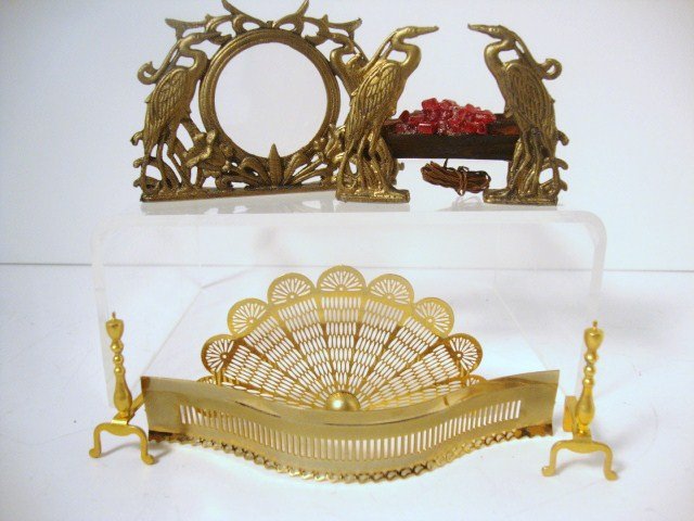 Brooke Tucker Fireplace Ornaments: Heron-shaped andirons and glassed fender from Brook Tucker 2"H, 3" L. Electrified. Offered with ClareBell accessories.