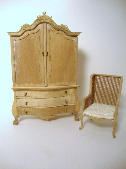 Bespaq Baby House Cabinet: An unfinished armoire with bombe' base that opens to reveal a six-room baby house with central staircase. Popular item for do-it-yourselfers. A little rough. 8" H, 5" W, with caned armchair.