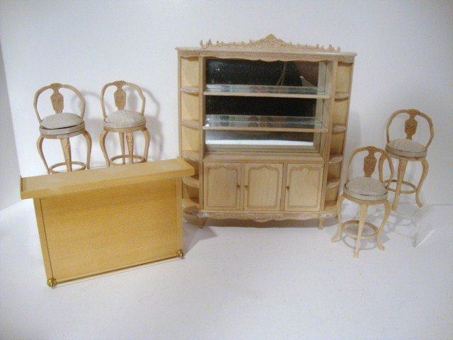 Bespaq Bar Furniture: A lot of unfinished furniture comprising an imposing back bar 8" H, 7.5" W, a bar with brass rail and four elegant matching barstools.