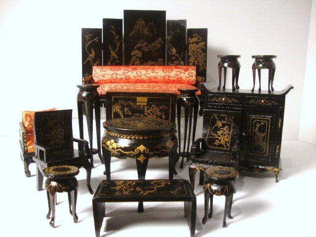 Lacquered Chinese Furniture: A large set of painted Chinese furniture with upholstered sofa 2.5" H, 6.25" L, chairs, cupboards, stands, folding screen, etc. The upholstered furniture is of superior quality.