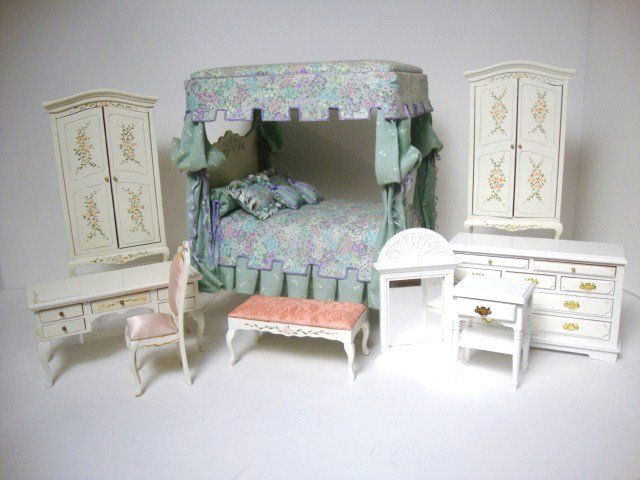 Carol Young Bedroom: A stylish upholstered bed with handpainted headboard by Carol Young 7" H and L, 5" W, with an assortment of painted bedroom furniture comprising two armoires, dressing table with bench, chair, nightst