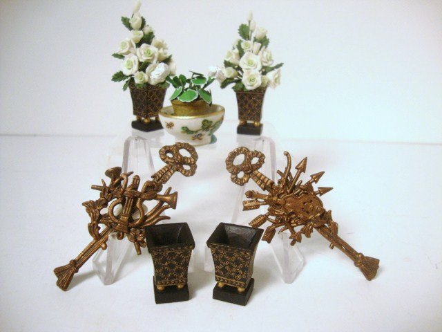 Decorative Cachepots: A pair of Chinoiserie cachepots filled with white roses just over 2" H, two empty pots with the same decoration, a china bowl with white geraniums attributed to Christopher Whitford, and two decorativ