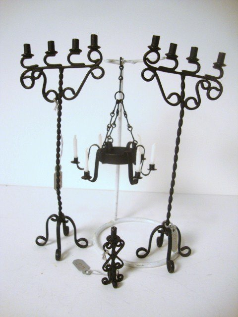 Hammer 'N Smith Lighting: Black metal candle lighting including a pair of floor candle stands 5.5" H, a six-arm chandelier and an ornate candlestick.