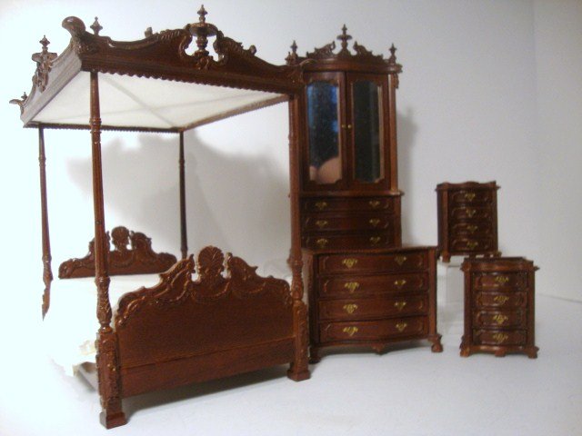 Bespaq Bedroom Suite: Very impressive Victorian Renaissance Revival bedroom set featuring a massive canopy bed with carved cornice 9" H, 7" L, 6" W (one finial snapped off but saved), very attractive mirrored armoire, two 