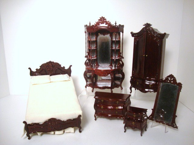 Bespaq Bedroom: Heavily varnished bedroom furnishings comprising a mirrored dressing table or console 9" H, 5" W, a bed, armoire, nightstand, chest and mirror.