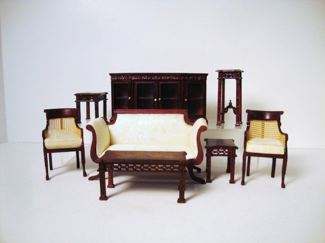 Bespaq Fretwork Tables: Four tables and stands with Chinese Chippendale fretwork decoration, a classical loveseat 3.25" H, 5.5" L, a sideboard with glazed doors and two Greek Revival chairs with caned panels.