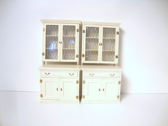 Hoffman Kitchen Cabinets: Marked B. Hoffman, a set of four painted kitchen cabinets, the uppers with simulated leaded glass 4.25" H, 3.5" W, one piece of cornice molding missing.