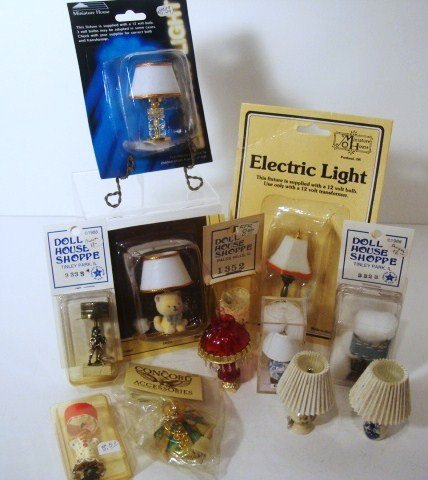Dollhouse Lighting: Selection of twelve dollhouse lighting fixtures including items made by Miniature House, Doll House Shoppe, Concord, etc. most in original packaging.