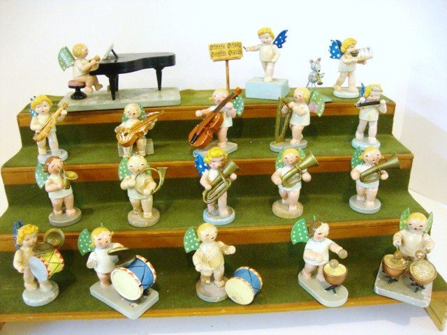 Erzgebirge Angel Band: Vintage German angelic wooden musicians, some labelled "Steinbach", most approx. 2.5" H. Some have paint loss or loose instruments, one missing lower arm. Most are very good. Eighteen angels and one m