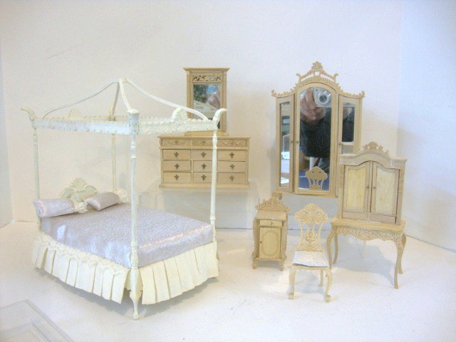 Unfinished Bespaq Bedroom: An elegant canopy bed painted with white primer and measuring 9" H, 8" L, 5.5" W, an unfinished mirrored armoire, triple dresser, lady's escritoire and chair, mirror and nightstand. All ready for pain