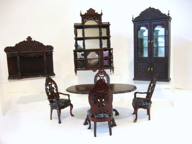 Ornate Bespaq Dining Room: Featuring very ornate hand-carved details, an eight-piece dining room suite with glazed china cabinet 8" H, 4" W, buffet, massive etagere, pedestal table and four upholstered chairs. An unfinished can