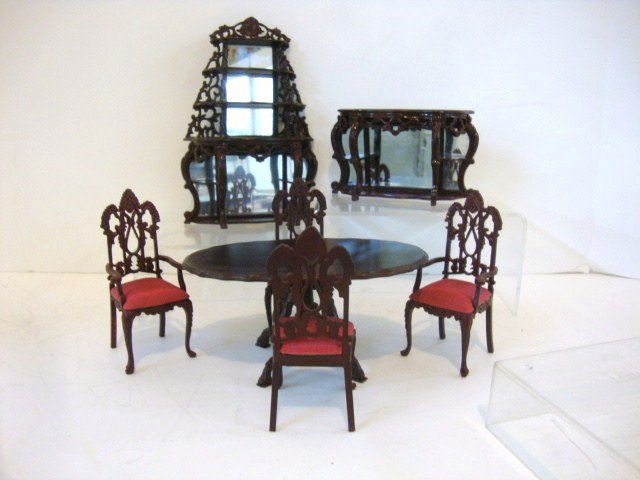 Bespaq Dining Set: Victorian dining room furniture comprising a large mirrored server 7" H, 5" W, matching buffet, a pedestal table and four upholstered chairs.
