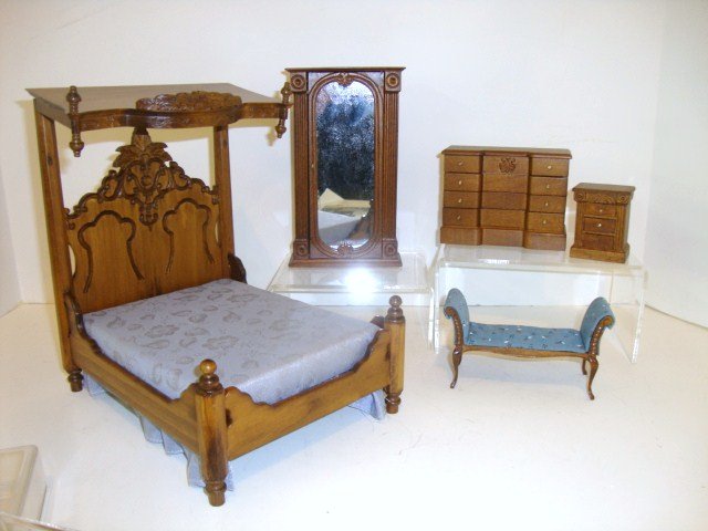 Victorian Bedroom Furniture: Massive half-tester bed with carved details 8.5" H, 8" L, 6" W (tester comes apart for upholstering), matching mirrored armoire, chest and nightstand, and a Bespaq upholstered bench.
