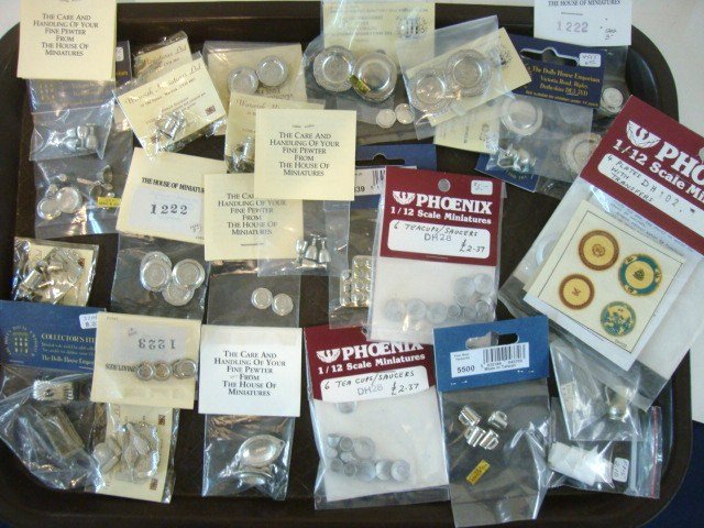 Pewter Dinnerware: Large lot of commercial cast pewter dinnerware including sets of plates from The Dolls' House Emporium 1" diameter, smaller plates by House of Miniatures, tankards and other items by Warwick Miniature