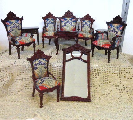 Bespaq Living Room: Sofa, three chairs, three end tables, mirror. all have labels 8 pcs 4 3/4" tallest