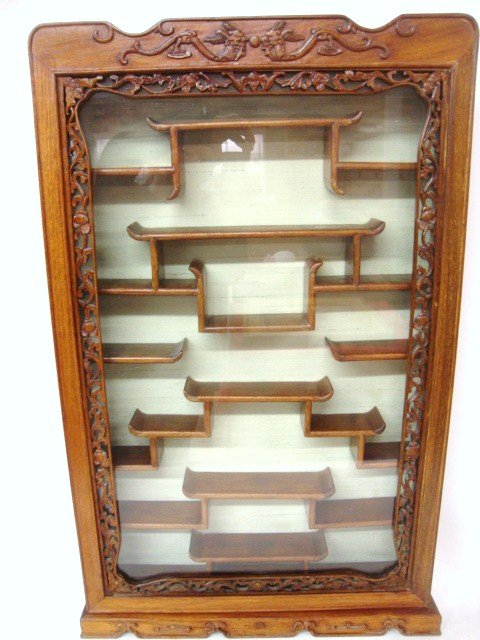 Oriental Curio Cabinet: Oriental Curio Cabinet with Carved Dragon Motif and Reticulated boarder, unique Shelves with oriental flare 32 1/2 x 20 1/2"