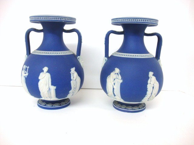 19th Century Jasperware Vases: A pair of deep blue 19th century Jasperware vases. Marked simply "Wedgewood" with an "n" and pattern number "109". 8 " h x 5" w.