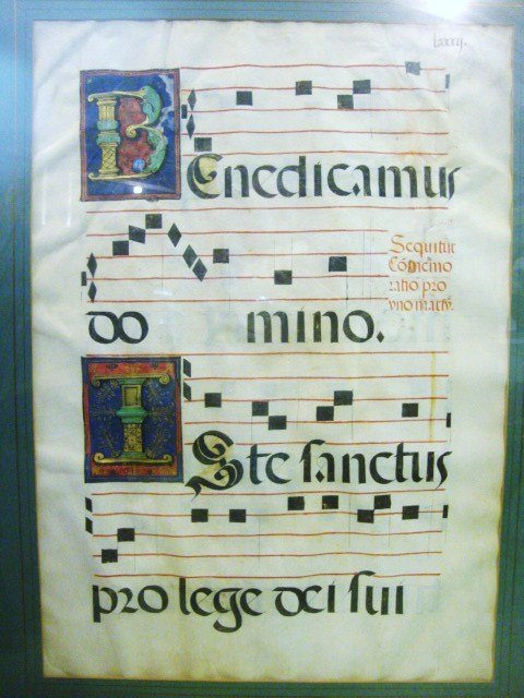 ILLUMINATED ANTIPHONY SHEET ON VELLUM: Framed Illuminated sheet music on vellum 28 1/2 x 19 3/4 sight, 37 1/2 x 27 1/2 overall. Illuminated B and Illuminated I. Great colors Sheet 16th century or earlier.