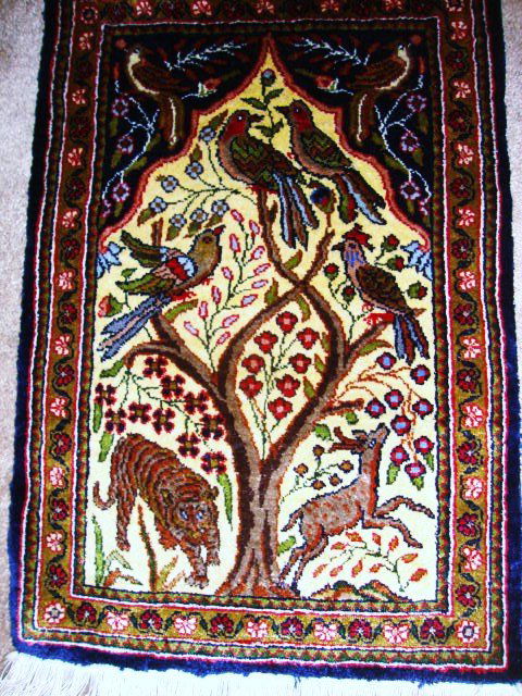 Small Silk Kashan Tapestry: Small Silk Kashan Tapestry with Ivory Field and Animal Figures , incredible design and Silk. 13 x 20", with 3" fringe on top and bottom. This is a beautiful wall hanging.