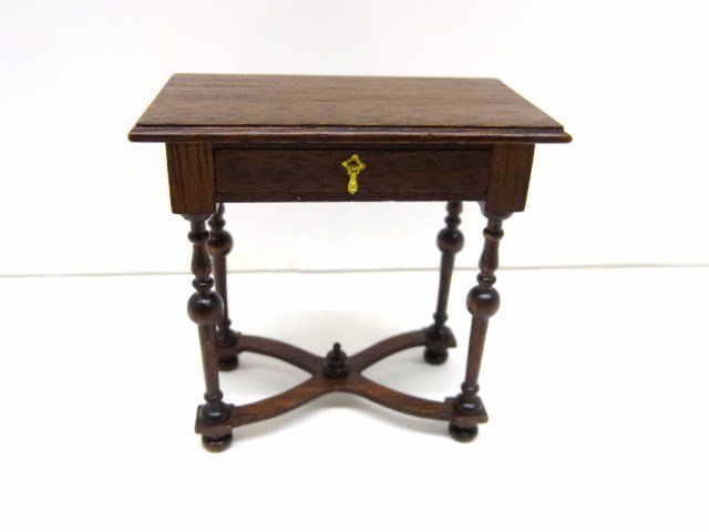 Derek Childenhouse Lowboy: A petite Jacobean mahogany dressing table or lowboy with delicately turned and braced trumpet legs and dovetailed drawer. 2.25" H and W.