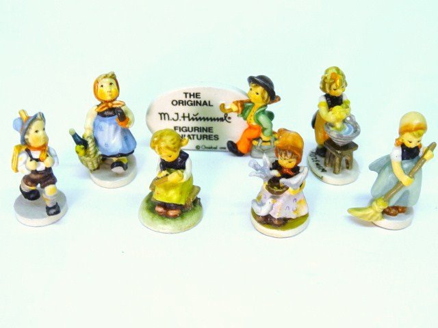 Olszewski Hummels: Little Sweeper 253-P,Feeding Birds 264-P, Dolly Wash 252-P, Busy Student 268-P, School boy 281-P, Merry Wanderer Plaque 280-P, Stormy Weather 256-P
