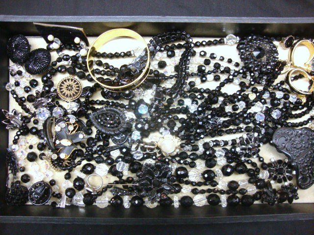 Vintage Costume Jewelry Black: Large Grouping of Black Beads, necklaces, pins, bracelets, earring and more.