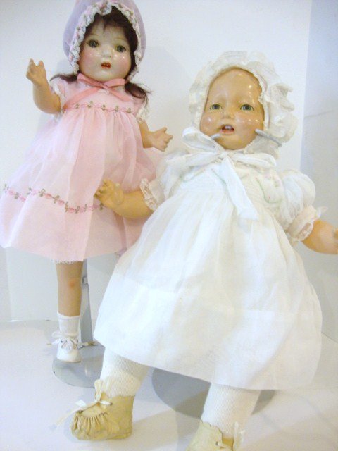 Effanbee Bubbles and Unmarked Doll: Effanbee Bubbles with sleep eyes,face is in nice condition, redressed, cloth body, 10", together with unmarked redressed composition doll. 23" H.