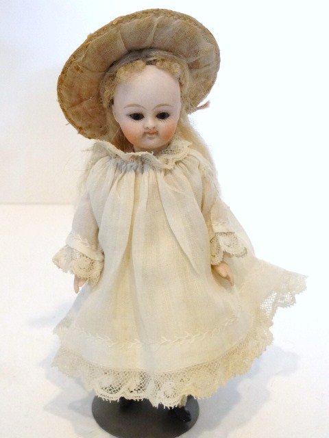 All Bisque Kestner Doll Pouty: Kestner 5.5" Pouty all bisque incised 1 1/2 on the back of head, has swivel head with brown sleep eyes on 5 pc. jointed body, arms and legs are peg strung, legs have leather at joint, high black four-