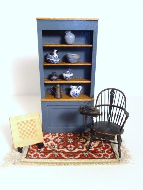 Artisan Windsor Writing Chair: Marked djC underneath, a nicely crafted writing chair with two drawers just under 3.5" H, an unmarked cupboard with assorted china and tin, and a reversible game board.