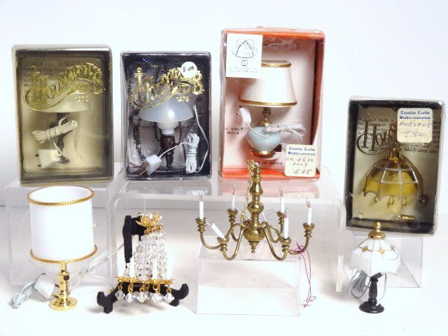 Electrified Light Fixtures: Eight different light fixtures including a traditional six-arm brass chandelier (tarnished), a Phyllis Tucker crystal chandelier 2" H and six commercial lamps with wiring.