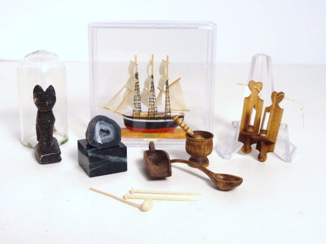 Fine Accessories: A ship model signed Gillick 1.5" H, a tiny geode on stand, and several finely crafted wooden accessories by David Krupick from the colonial era.