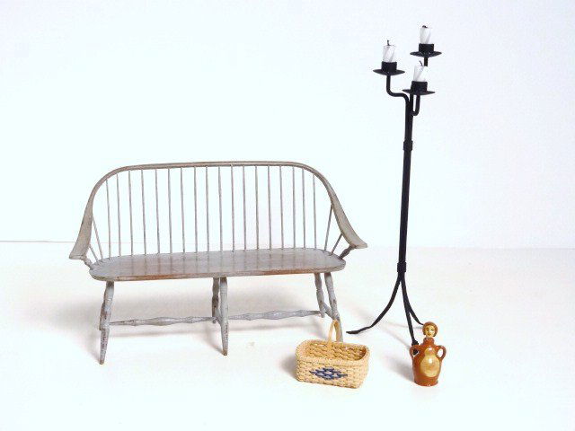 William Clinger Windsor Bench: A nicely proportioned Windsor bench by William Clinger with a worn grey painted finish by Susan Rountree, a wrought iron candlestand 5.25" H, a woven basket signed KB and a redware lady jug by Jane Gr