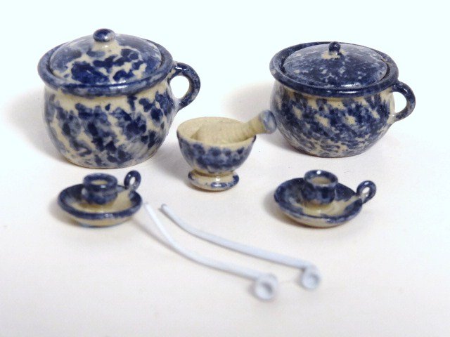 Jane Graber Spatterware: Two covered chamber pots, two candlesticks, and a mortar and pestle by Jane Graber with two clay pipes about 1" L.