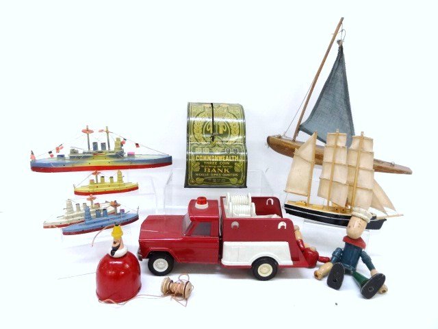 Commonwealth Register Bank, Wood Boats, Etc.: Tin Register bank 5 in. (H), 6 wooden boats 10 in. longest, tin mini-Tonka jeep, fire truck 10 in. (L), plus 2 wood string toys