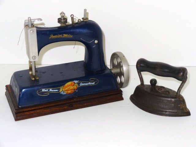 Cast Irons and Sewing Machine: Cast irons, West Haven Artcraft, sewing machine 7 in.