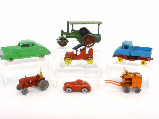 Lesney Matchboxes & other cars: Two grey wheel Matchboxes, truck no wheels, two slush style cars, great Tootsietoy Sedan and matchbox Steam Roller 1 1 /2"