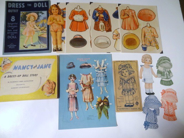 Vintage Paper Doll Grouping: New dressing dolls, Cousin Marguerite 6 1/2 in. doll, 3 dresses, 3 hats, Tutokraft dress the doll in original pack & uncut, pencil writing on front & back (1947), Nancy & Jane by Alexander, book uncut