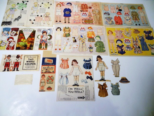 Advertising Paper Dolls: The Ceresota Bay on Coupon uncut, Cracker Jack uncut, Dolly by Kellogg uncut, The Sterizal Co. on uncut, one uncut sheet, Minneapolis Garments 3 uncut sheets