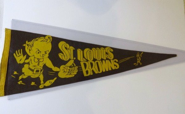 1940's St. Louis Browns Pennant: 1940's St. Louis Browns pennant, 11 x 28 in., w/box type figure catching ball, w/pennant shield, brown & gold