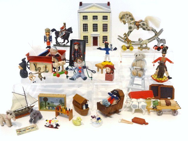 English Nursery: Very large assortment of artisan quality toys and nursery items including a doll's Georgian dollhouse 3.5" H (hinge broken), rocking horse, high chair, doll cradle, doll in box, teddy, pull toys, slat